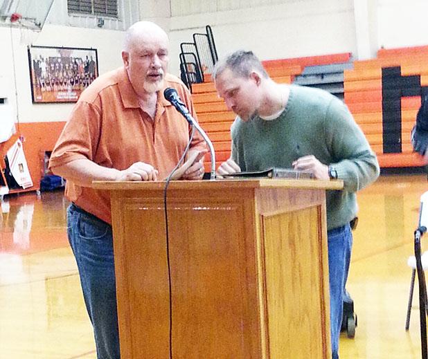Keith Cabanaw, vice principal of Middleton High School presents Blake McMeans a donation to Blake’s foundation. The non-profit foundation is supported by donations and finances McMeans expenses as he visits schools, churches, and civic organizations to deliver his message about the consequences of drinking and driving.