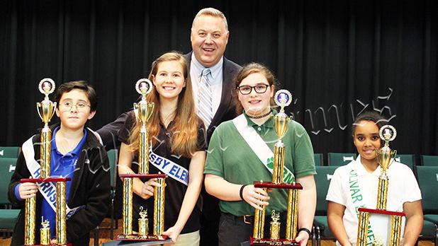Allen Defends Spelling Bee Title Pictured above right to left (with Hardeman County Superintendent of Schools Warner Ross, II) 1st place Jace Allen of Hornsby, 2nd place Shelby Smith of Hornsby, 3rd place Kaylee Bryant of Bolivar Middle, and 4th place Jaliyah Woods of Bolivar Elementary. Photo by Jessica Simmons.