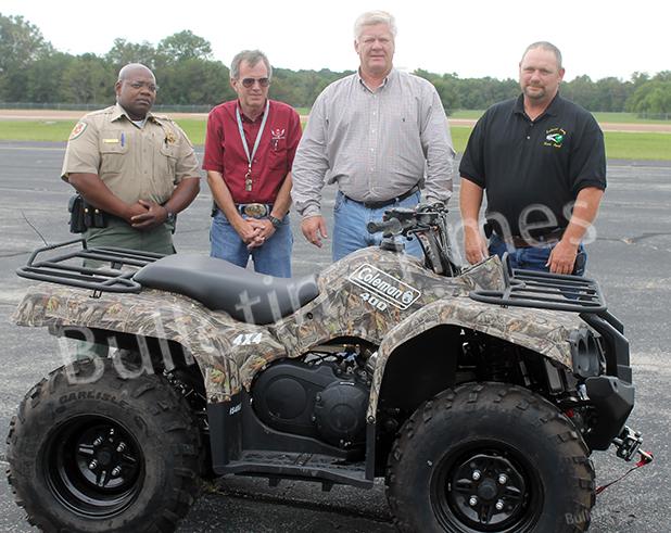 County wins ATV from Southwest Photo by Amelia Monroe Carlson Pictured with the new ATV (l-r) is Sheriff Department Lt. Michael Hatch, Airport Manager Shelby Isham, Hardeman County Mayor Jimmy Sain and Rescue Squad Officer Darren Grantham
