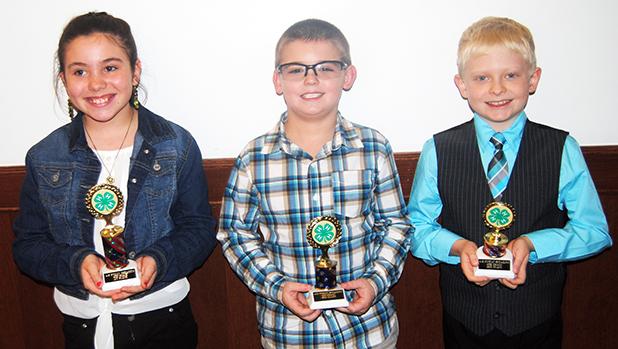 4-H public speaking contest winners fourth grade pictured (l-r): Maddie Willis (first place), Avery King (second place), and Jonathan Banks (third place).