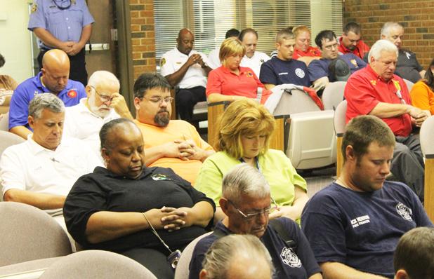For those who rush in, while others rush out Emergency personnel from Hardeman County, joined by personnel from Madison County and Somerville, gathered the morning of September 11 for prayer and remembrance of the victims of the terrorist attacks of September 11, 2001, and specifically for the emergency responders who lost their lives trying to save others on that day.