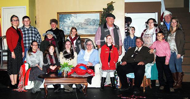 The cast of “A Christmas Story” Front row (l-r) Shelby Smith (extra), Hollie Allen (Helen Weathers), Calley Overton (extra). Kristen Enders (extra), Isabella Lax (extra), Christopher Ramage (Old Man), Caleb Sowder (Randy). Back row (l-r) Carly Weems (Miss Shields), Payne Pulse (Schwartz), Noah Cody (Flick), Michael Davis (Farkas), Lily Reid (Esther Jane), Anthony Pulse (Ralph), Campbell Emerson (Ralphie), Kathy Weaver (Mother), Mark Peterson (Santa Clause, delivery man,tree salesman), Leah Grantham (directo