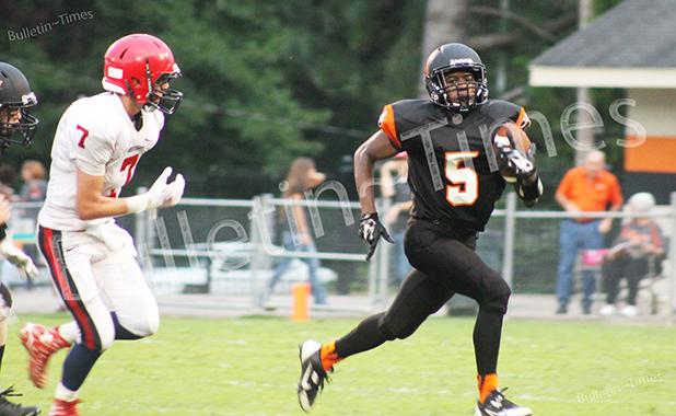 Trae Anderson takes off downfield against the RCA defenders
