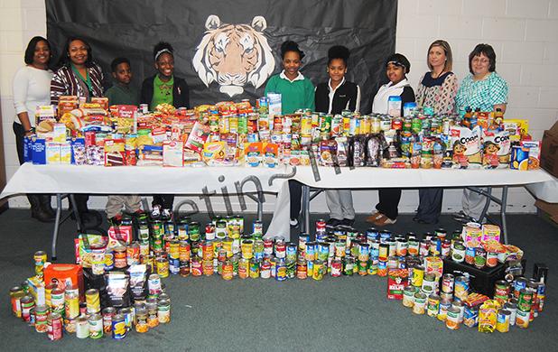 Pictured (l-r): Quintessa Stewart (Choices Count), Ashanti Joy (Choices Count), Kendrick Amanfe, Tayjah Beard, Aquilla Beard, Tamya Blakemore, Kendaisha Blake, Penny Russell (Beta), Shelia Parmely (Beta)