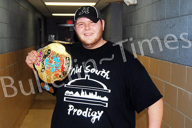 Bam Bam Bundy, better known as Grant Hatton to his friends in Bolivar shows off his Ripley (TN) All Pro Wrestling championship belt.	