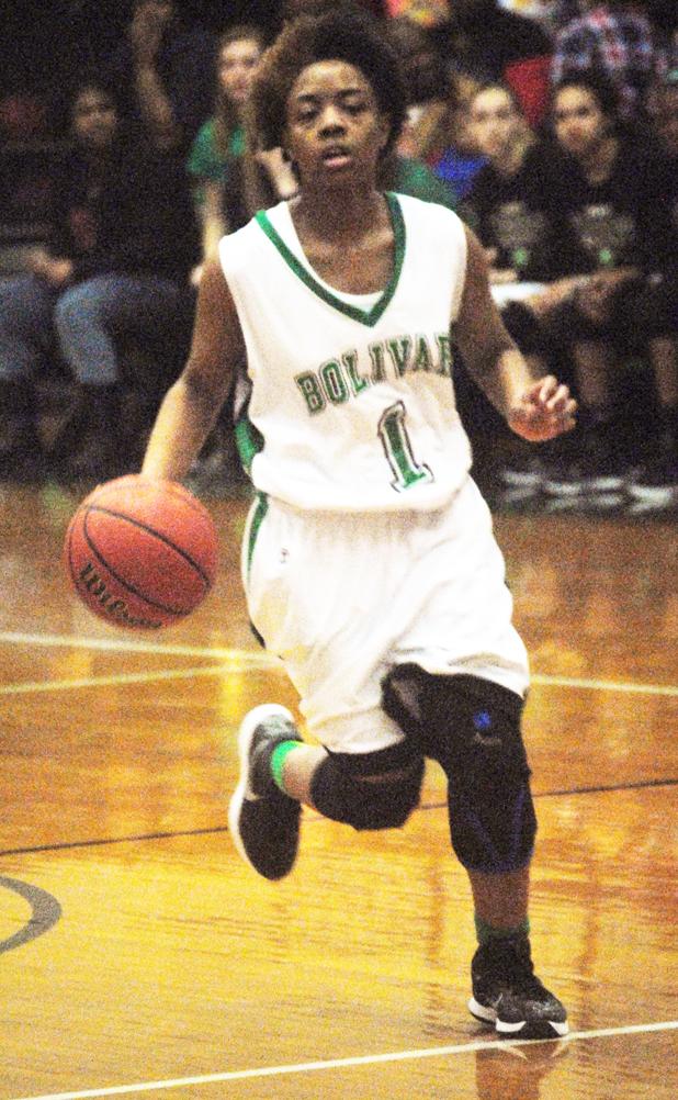 Bolivar Central loses a pair to South Side Kenylsha Bryant handles the ball for the Lady Tigers during their game against South Side.