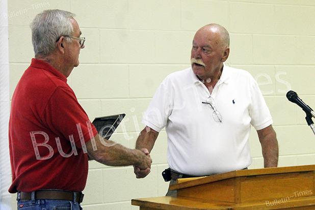 Bell retires from city after 45 years Bolivar Mayor Barrett Stevens (left) presents Lloyd Bell with a plaque of appreciation for the 45 years of service he has given to the citizens of Bolivar as a city employee.