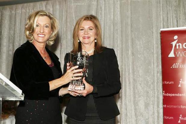 Independent Women’s Forum Board Member Lisa Gabel presents Congressman Marsha Blackburn with the 2014 Barbara K. Olsen Woman of Valor award.