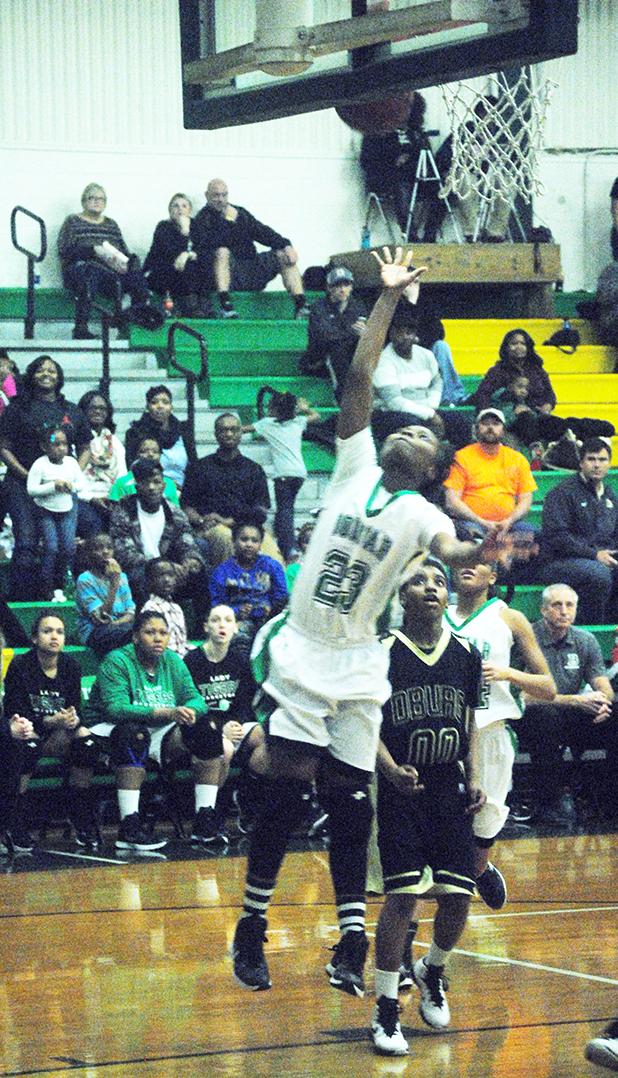 Bolivar ladies defeat Dyersburg, fall to Crockett County in regional semifinal LaKayla Waddell goes up for two-points.