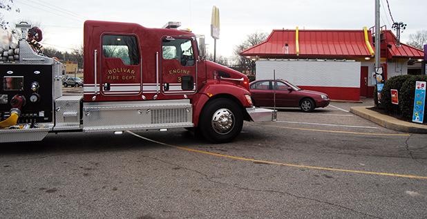 Bolivar Firefighters respond to a grease fire at McDonald’s a short time after a bomb threat had been called into that location. The two events were unrelated.