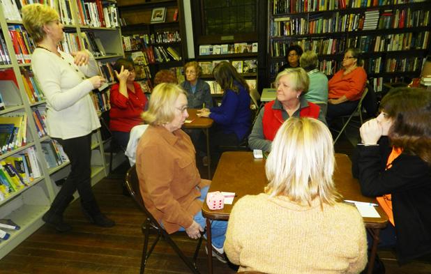 Grand Junction holds Bunko fundraiser The Grand Junction Public Library held a Bunko fundraiser Thursday night. Funds raised will be used along with a matching grant to purchase new computers. Loretta Bell, librarian, is shown advising the attendees of the ground rules for play. “Our libraries are notoriously underfunded and fundraisers similar to this one are required to purchase needed equipment,” said Bell.