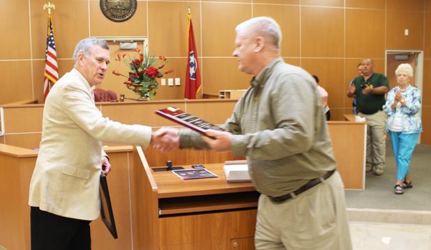 Remembering the days Former Hardeman County General Sessions and Juvenile Court Judge Charles “Chip” Cary was presented with a plaque of appreciation and many other gifts during his retirement party on Friday, September 19. Pictured is Hardeman County Mayor Jimmy Sain presenting Cary with a plague in appreciation of his service to the county.