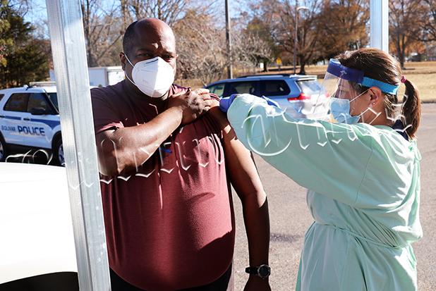 Bolivar Police Chief Mike Jones gets the Moderna COVID-19 vaccine at the Hardeman County Health Department from Melissa Anderson.
