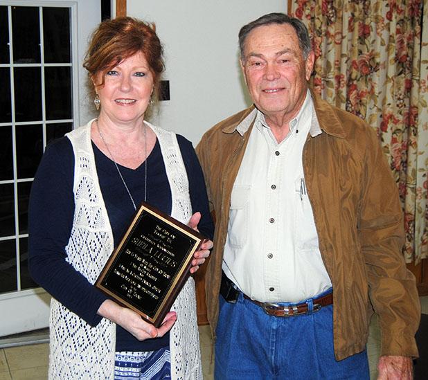 Toone Mayor honors city recorder Toone City Recorder Shelia Lucius is presented a plaque by Mayor Joe Jones for 13 years of dedicated service to the City of Toone.
