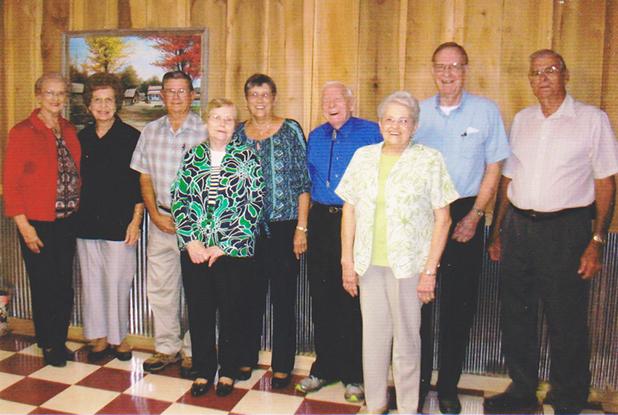 MHS Class of 1954 holds reunion Pictured (l-r): Ann Sexton Wells, Elaine Trainum Capshaw, Buck Robinson, Janice Kirk Robinson, Burnell Dixon Holland, Gerald McBride, Emily Vincent Mills, J.P. Shelly and Marvin Mills.