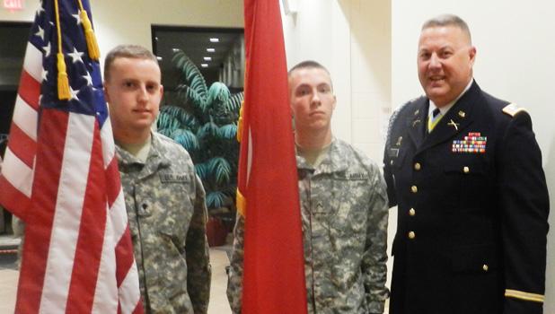 Specialist Hugh White, left, along with Private Shaun McEvoy of the Tennessee National Guard presented the colors at Middleton Elementary’s salute to our nation’s veterans. They are shown with Lt. Col. Warner Ross who gave the keynote address.