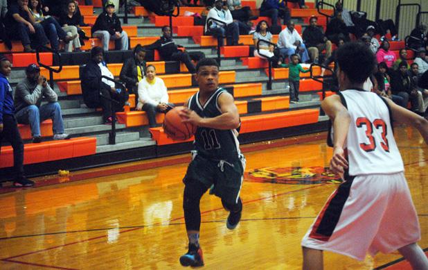 Bolivar Middle boys advance to tourney finals Omar Jones drives the lane for Bolivar during their semi final against Middleton.