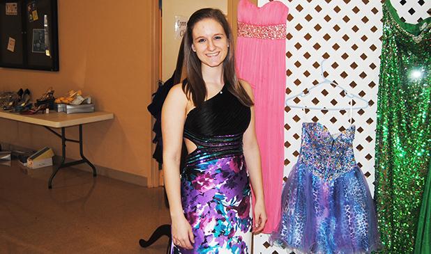 Bolivar FUMC holds 'A Second Dance' prom dress sale Pictured, Amber Bailey tries on one of the dresses on sale at the “A Second Dance” prom dress sale.