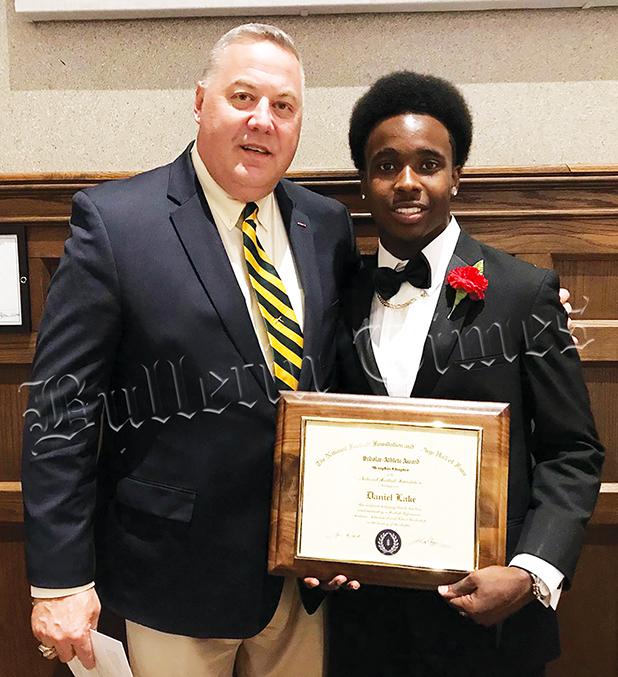 Bolivar Central football player Daniel Lake received a scholar-athlete award from the National Football Foundation.  Previous winners of the award from Bolivar Central are Mason and Mitch Ross. Lake is pictured with Hardeman County Superintendent of Schools Warner Ross. 