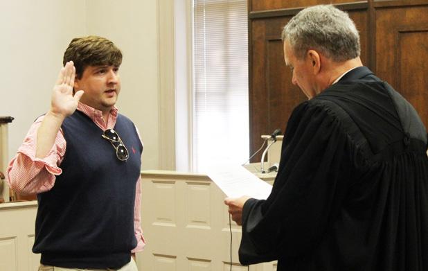 David Young was sworn in as a county commissioner in August by Judge Charles “Chip” Cary and succeeded his father in serving on the county commission.