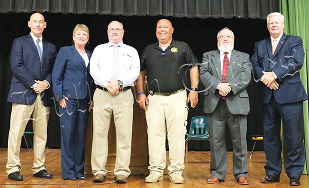 WMOD, The Bulletin Times and the Hardeman County NAACP hosted the county debate on July 10 at Bolivar Central High School. Left to right: Bolivar Police Chief Pat Baker, Kandy Shackelford, Toone Police Chief Jerry Siler, Hardeman County Sheriff John Doolen, Calvin Howell, and Hardeman County Mayor Jimmy Sain.