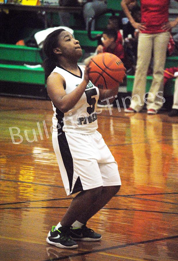 Dekiya Jarrett shoots a free throw for the Bolivar Middle School Tigers