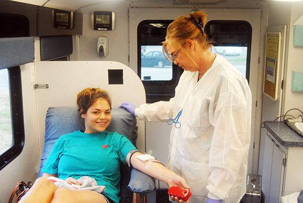 Fire Department wins The Battle of the Badges Brianna Gay of Bolivar gives up a pint of blood to Jill Vantrease of Lifeline for the Battle of the Badges blood drove. Gay decided to donate her pint in honor of the Police Department.