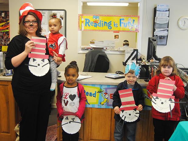 Dr. Seuss day at Middleton Library Those attending Dr Suess day at the Middleton Library were: Cynthia Scott, head librarian, holding Tinayah Joy, Kaliya Joy, Miles Taylor, Anna Watkins.