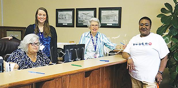 Elaine Woods was the first to vote on May 1. She is joined by (left to right) Hardeman County Administrator of Elections Amber Moore, and election staffers Amy Cleek and Barbara Grant.