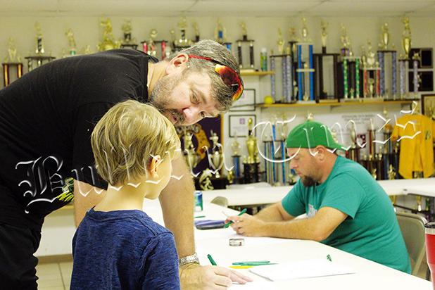 Fall Baseball Signups in Bolivar Jay Somers signs up his grandson Tatum Lanini up for fall baseball at the Lion’s Club. Registration will be also be held Saturday, August 26 from 10:00 a.m. – 12:00 p.m. Photo by Jessica Simmons