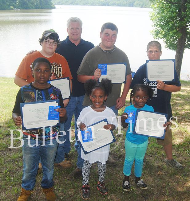 Fishing rodeo held at Whiteville Lake Winners of the 2015 Inman E. Pettigrew Fishing Rodeo pictured front row (l-r) Montarious Douglas, Lion Collin, Aubrey Robertson. Back row (l-r) Devin McBroom, Hardeman County Mayor Jimmy Sain, Caleb Atkins, Alan Thompson.