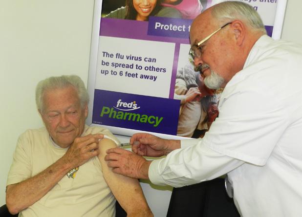 It’s far more dangerous than Ebola Bill Stone, Reporter, Bolivar Bulletin Times, receives his annual flu shot from Cliff Edwards, Registered Pharmacist, Fred’s Pharmacy in Bolivar.
