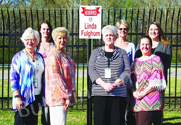 Honoring a Career Public Servant Pictured with Fulghum (center) are (left to right) staff members: Pat Kirk, Brittany Tibodeau, Dorothy Gatewood, Fulghum, Rhonda Sipes, Michelle Johnson, and Crystal Pannell.