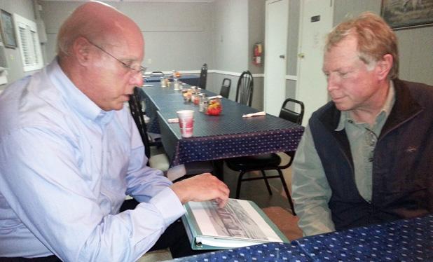 Gerald Wade, shown on left, discusses progress of Grand Junction Depot restoration with Lou Kerns.