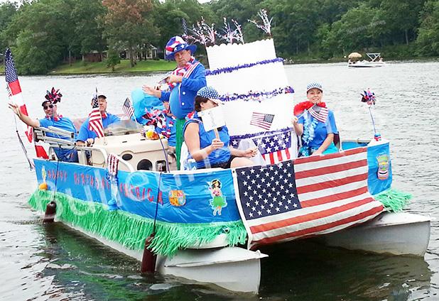 First place trophy in The Grand Valley Lakes Annual Boat Parade went to Jim Gehringer and crew aboard “Happy Birthday America”. Sixteen beautifully decorated boats from jet skis to pontoon boats and everywhere between entered the event. The theme for this year’s parade was “Aloha Grand Valley”. Gehringer’s boat was festooned with a combination of birthday cake, flags, Uncle Sam, lots of red, white, and blue all blended with a Hawaiian motif and Don Ho singing “Tiny Bubbles”.