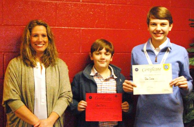 Winner announced in National Geographic Bee Pictured (l-r): Tammy Bowling Geography Bee Sponsor, Ben Morris, and Jake Cocke
