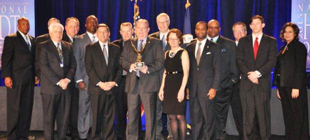 Task Force receives national recognition Pictured front row (l-r): Tony Soto, Director – Gulf Coast HIDTA; Michael Botticelli, Director – Office of National Drug Control Policy; Brian Chambers, Resident Agent in Charge – DEA; Mary Lou Leary, Deputy Director – Office of National Drug Control Policy; Edward L. Stanton III, U.S. Attorney – U.S. Attorney’s Office. Back row (l-r): Lt. Robert McIntyre – Memphis Police Dept.; Garrison Taylor, Task Force Officer – DEA; Mark Dunbar, Asst. Chief – Shelby Co. Sheriff’s Office; Ian James, Detective – Memphis