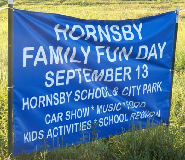 Hornsby aldermen decline franchise fee Sign outside Hornsby for Family Fun Day.