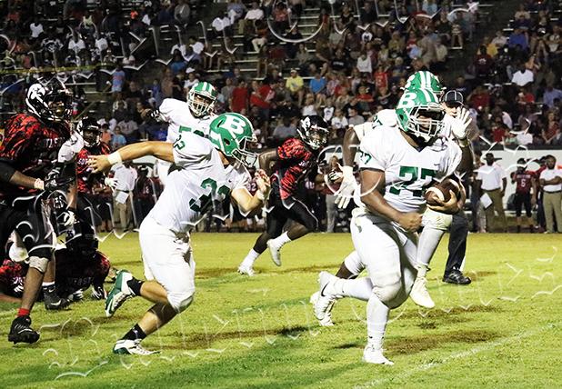 Tigers Ran, But They Couldn’t Hide Xavier Dickerson ran 40 yards for a score to give the Tigers a 12-10 lead with 4:48 left in the third quarter. Photo by Ginger Tester.