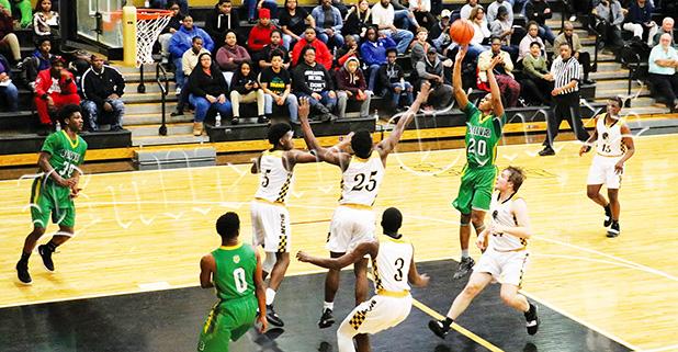 Juquan Lax was among four Tigers in double figures on January 22 against Millington. Lax had 11, D.J. Smith had 12, and Tovarious Woods had 12. Antavious Shaw led Bolivar with 14 points and 11 rebounds. Photo by Ginger Tester. 