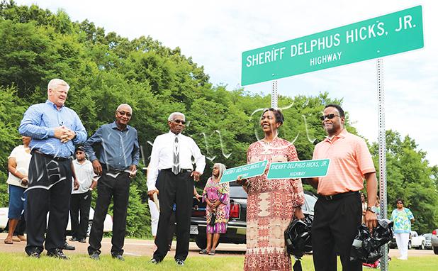 Photo from left to right: Hardeman County Mayor Jimmy Sain, Tennessee State Representative Johnny Shaw, Hicks and children Diane Redditt and James Hicks.  Photo by Ginger Tester.