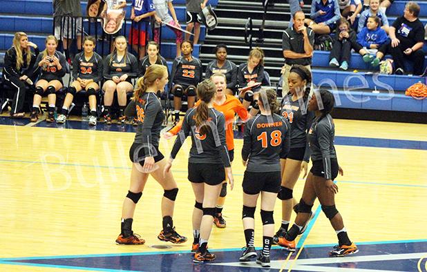 The Lady Tigers celebrate an ace during the match with South Greene. Photo by Holli Teubner. 