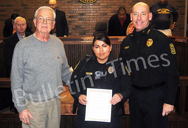 Officer Munoz recognized for saving life Bolivar Mayor Barrett Stevens presents a letter of recognition to officer Juana “Nelly” Munoz. Photo (l-r) Bolivar Mayor Barrett Stevens, Juana “Nelly” Munoz, Bolivar Police Chief Pat Baker.