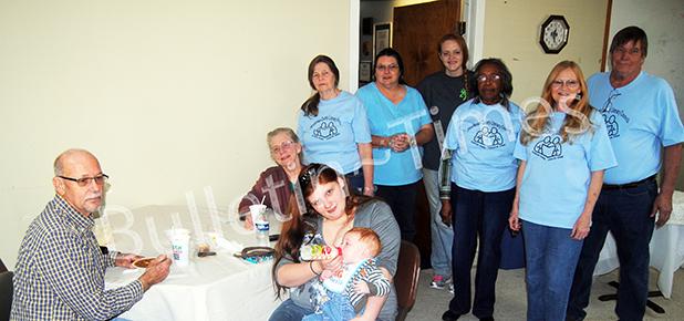 seated (l-r): Lee Sammons, Jane Woods, Madison Woods, (baby) Leon Smith. Standing (l-r): Betty Jordan, Darlene Carroll, Rebecca Simpson, Hugholene Robertson, Annette Lowrance, Larry Lowrance.