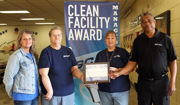 Middleton Elementary School was awarded the cleanest school by GCA for the month of April. Pictured (l-r) Christy Graves (assistant principal), Shelia Bailey (supervisor), Robin Lassiter (janitor) and Udell Futrell (GCA account manager). Not pictured is Shareese Robinson.