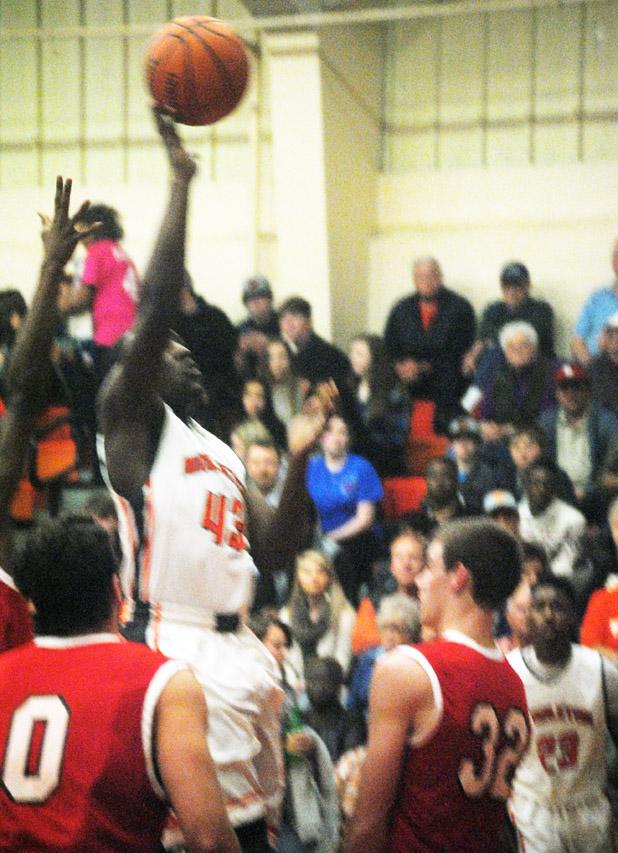 Detric Agnew Shoots the ball for Middleton during their game against Adamsville.