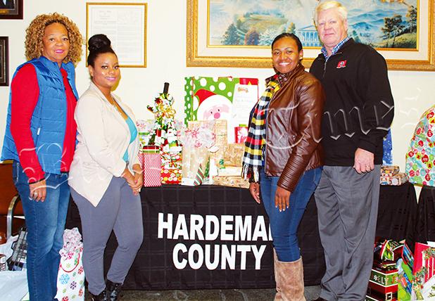County Comes Together for Kids Cleo Griggs, Patrice Woods, Lakeesha Reeves of Centerstone, and Hardeman County Mayor Jimmy Sain. Centerstone provides an array of services ranging from Residential Group Care, Therapeutic Foster Care and Adoption Services for children and families. For more information on foster care through Centerstone, call 844-936-7837. Photo by Jessica Simmons.