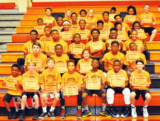 Players Learn Basketball Fundamentals at Middleton Camp ictured are playes who attended the Middleton Fundamental Basketball Camp that was held at Middleton High School.