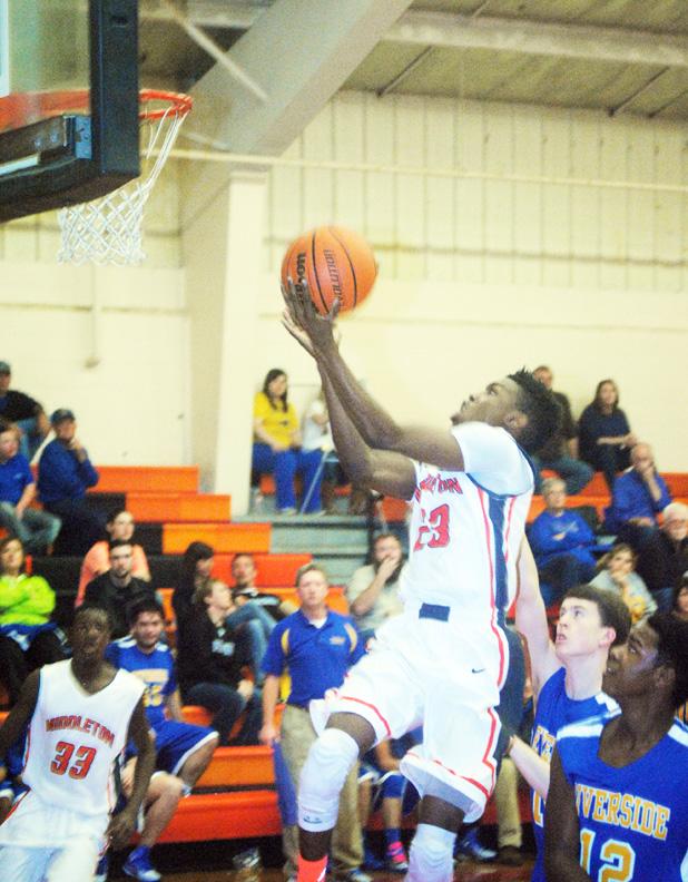 Latavvis Golden goes up for two points during Middleton’s game against Riverside.