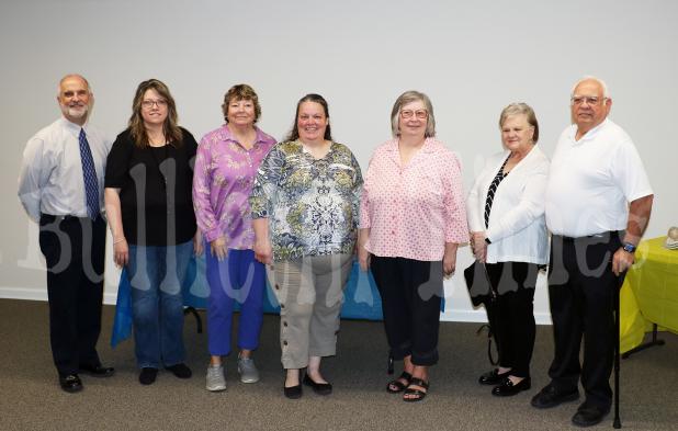 Photo left to right: Randy Bishop, Cynthia Scott, Maggie Barrowclough, April Simpson, Wanza Taylor, Annette Cornelius, and Carl Gibson of the Middleton Community Libary Board. 